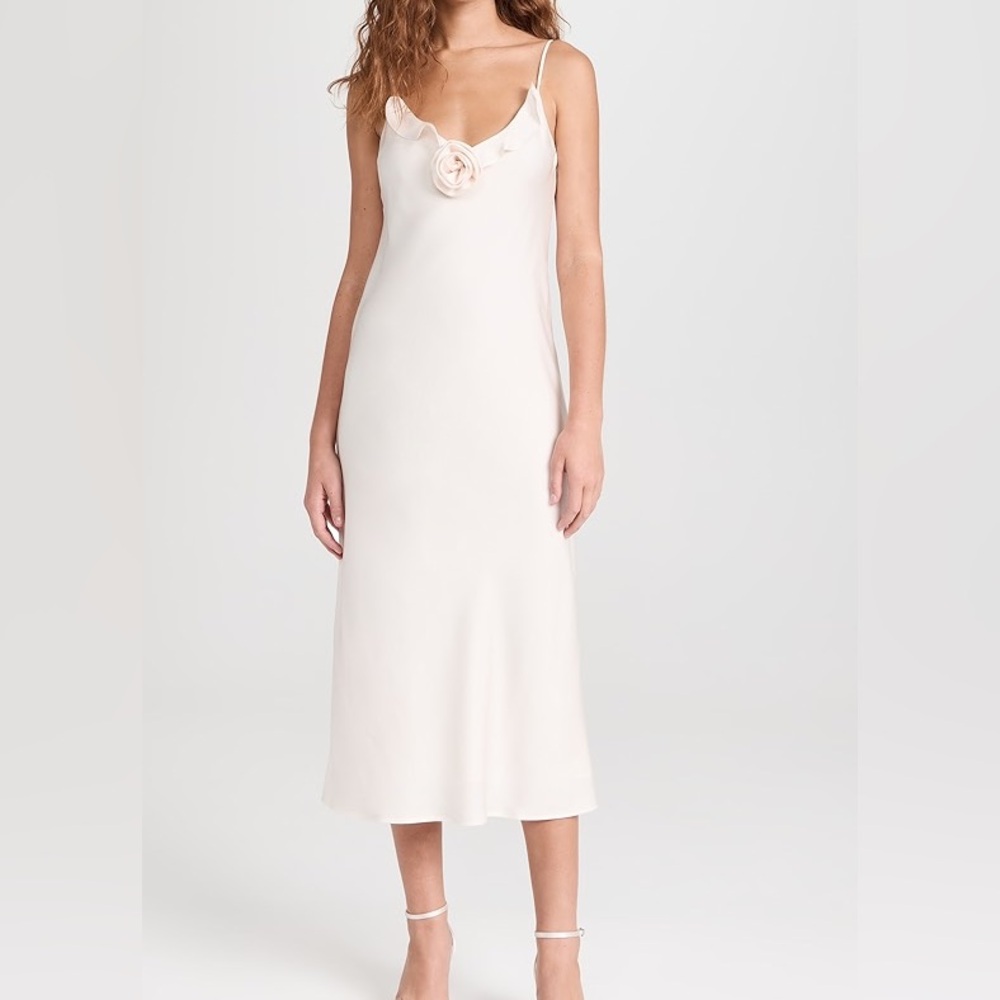 Wayf ivory slip dress with an attached flower
